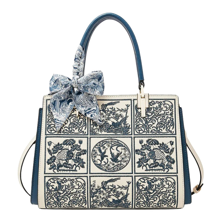 Sylvia™ – Wyjątkowa torebka crossbody z haftem i kokardą
